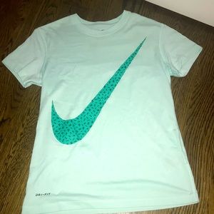 A Nike teal dri-fit t-shirt with blue Nike swoosh